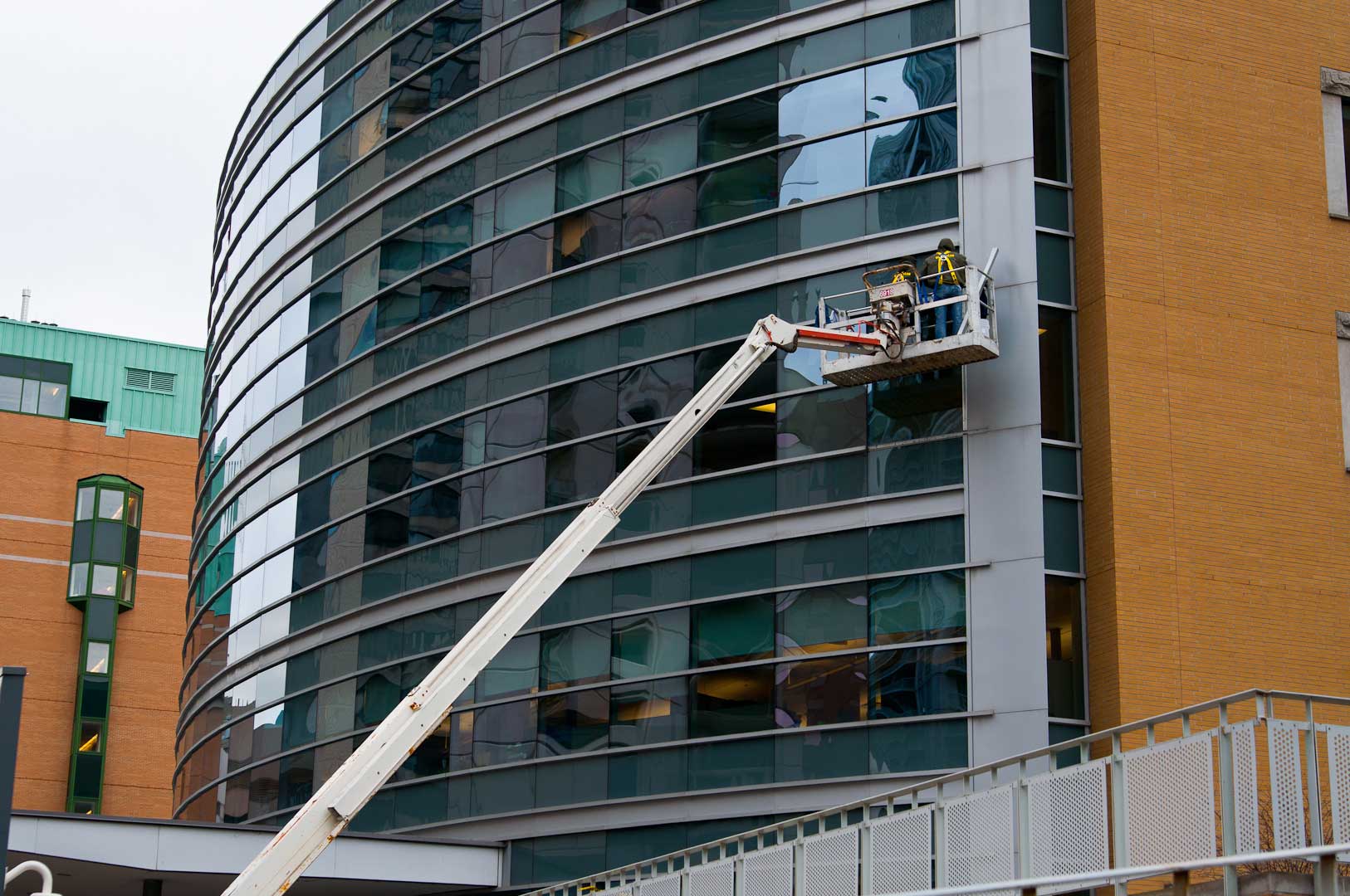 Telescoping Boom Truck Used to Access Building Facade in Toronto by Explore1