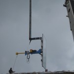 Explore1 technicians prepare to install a 3500 lbs IG Unit with C hook